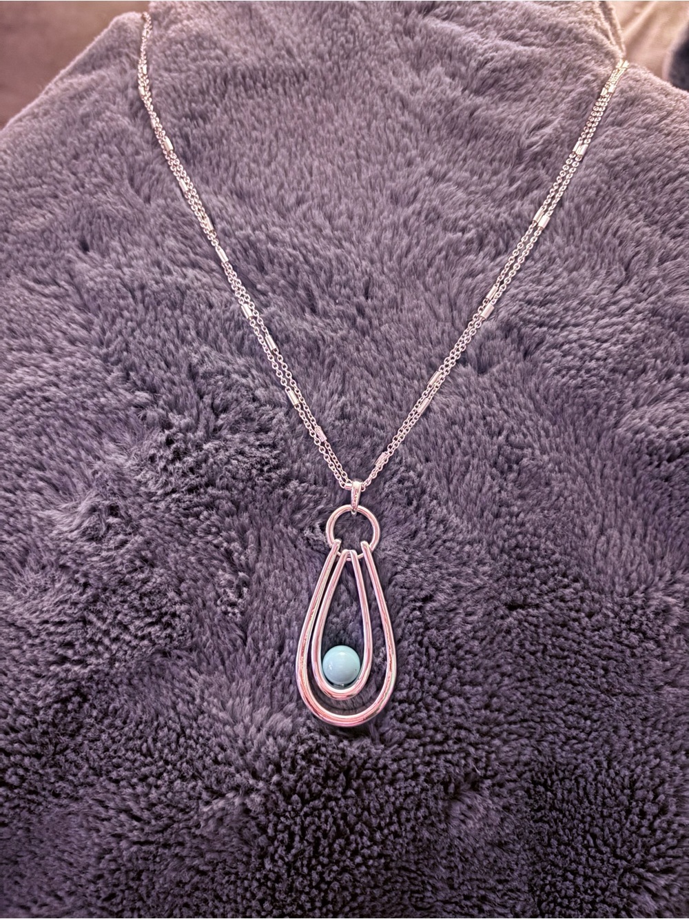 Napier Silver Teardrop Pendant Necklace with Light Blue Stone